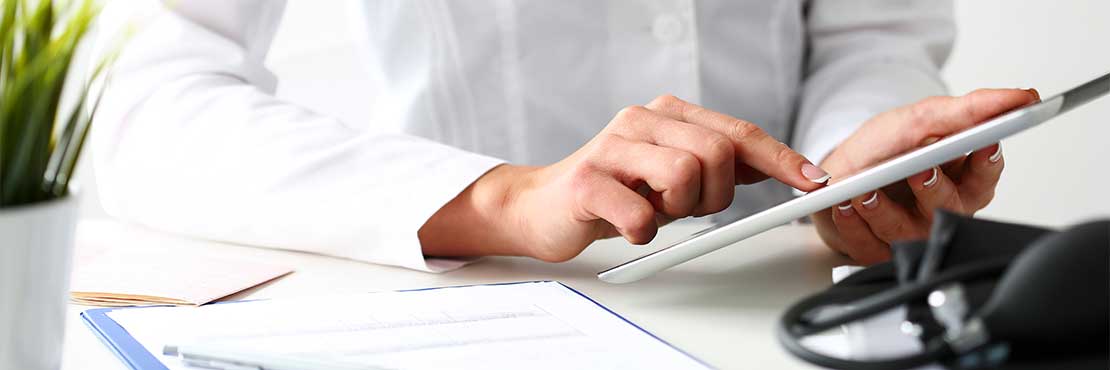 Doctor using a mobile device